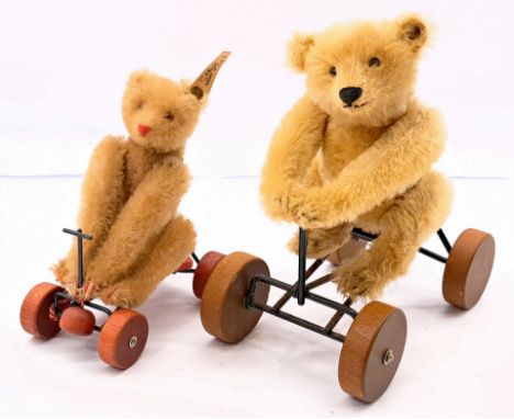 Steiff Teddy bears on bike pair including: (1) Museum Collection Record Teddy Replica 1913, white tag 400704 (0098/20), LE 40