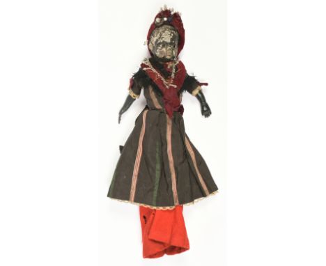 Black wax over composition shoulder head doll, c 1870, inset black pupil-less eyes, wooden jointed body, black kid leather ar