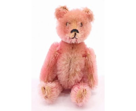 Schuco pink vintage compact teddy bear, German, 1920s, pink mohair, black metal bead eyes, black horizontally stitched nose, 