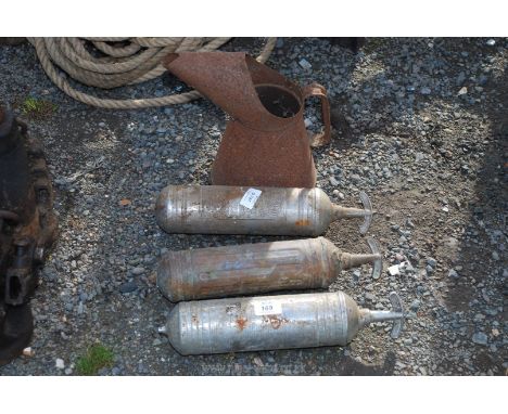 Three pup-action fire extinguishers including Desmo and an oil can.