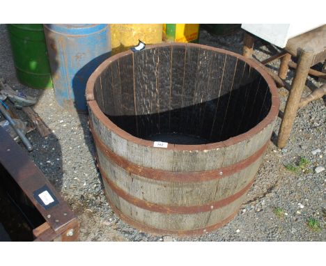 Half barrel garden planter.