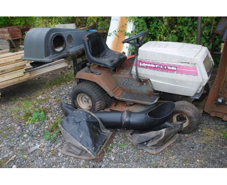 A Lawn Flite 756 12 HP 38" cut All Wheel Steer ride-on lawn mower and grass collector attachment with two bags. For re-commis