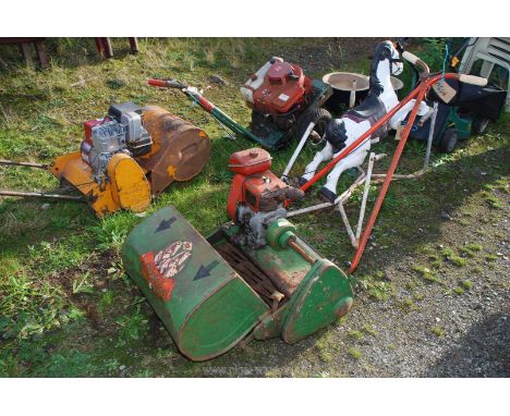A Suffolk Super Punch dual drive petrol engined mower with fine-cut blade. Engine turns but not started, no fuel. Ex disbande