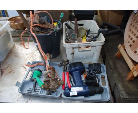 Boxed battery drill and two tubs of hand tools, brass beer taps etc