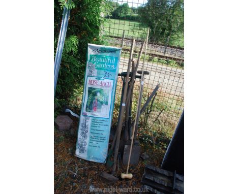 Quantity of spades, garden tools and a rose arch.