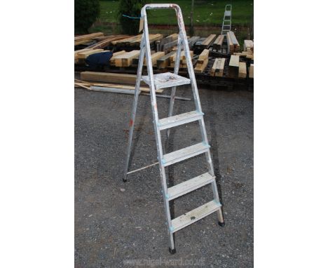 A four rung aluminium step ladder.