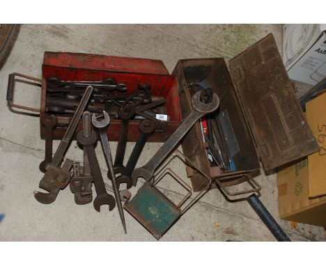 Two ammunition boxes of tools and contents: spanners, grips etc.