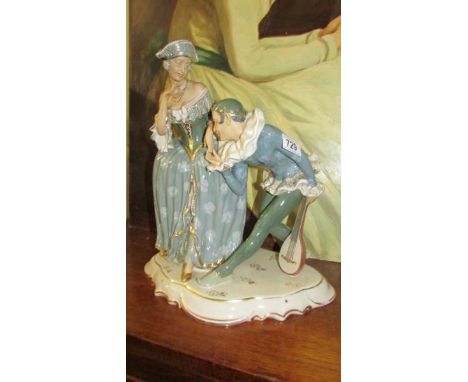A large Royal Dux art deco mandolin playing Pierrot with lady