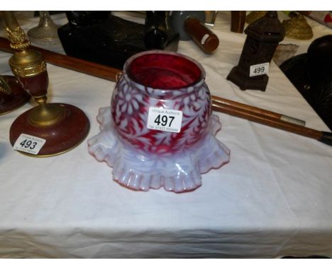 An overlaid glass lamp shade