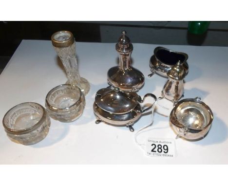 A mixed lot of silver plate condiment items