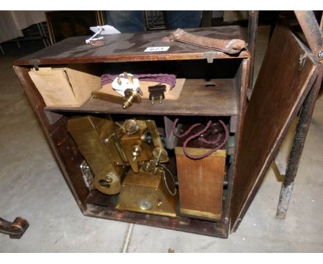 A cased vintage cine projector