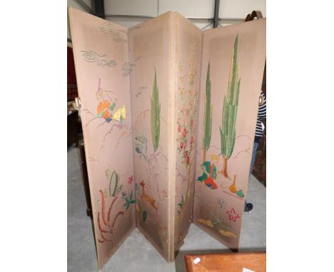 An embroidered triple folding fire screen