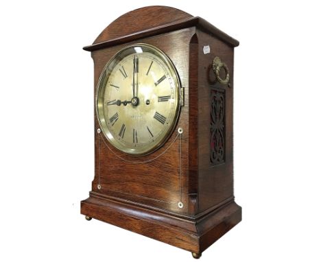An oak bracket clock inscribed Grant, Cardiff