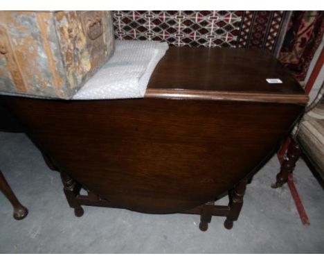 An oak gate leg table