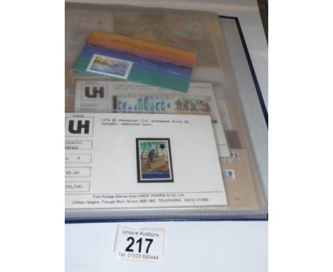 A folder of mint stamps including sets and singles, first day issues, etc