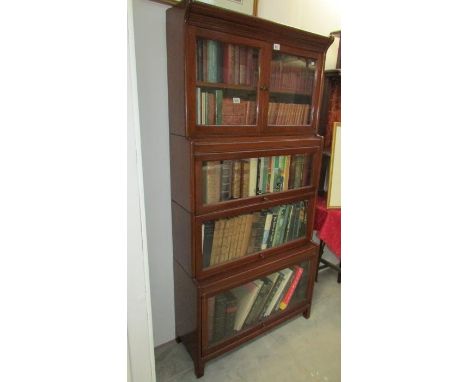 A 4 tier Globe Werrnicke style book case