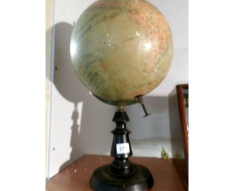 An early 20th century terrestrial globe by J Forest, Paris, 40,000,000, 1mm to 40km ****Condition report**** Poor condition, 