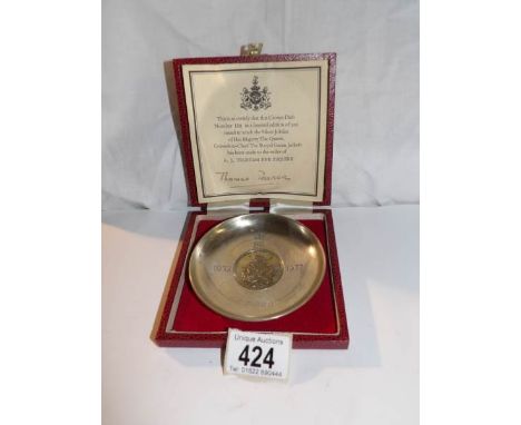 A cased silver dish for the Queens silver jubilee