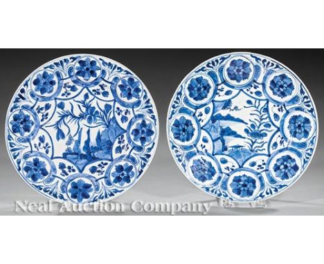 Near Pair of Chinese Export Blue and White Porcelain Dishes, 17th/18th c., central star panels with plants and rocks in water
