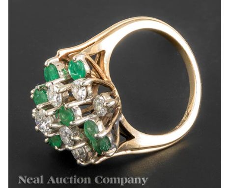 18 kt. Yellow Gold, White Gold, Emerald and Diamond Cluster Ring, set with 10 brilliant cut diamonds totaling approx. 1.15 ct