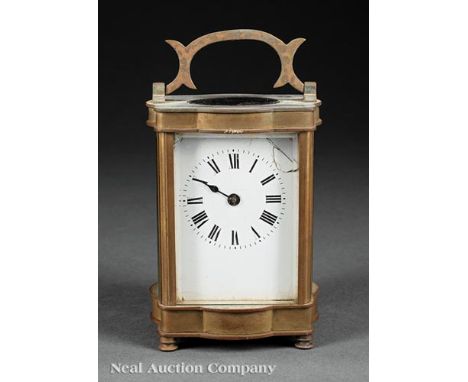 French Brass and Crystal Carriage Clock, early 20th c., visible escapement, all sides with beveled glass, bale handle, h. 4 1