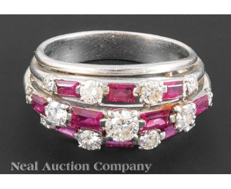 Platinum, Ruby and Diamond Triple Band Ring, set with 10 baguette natural rubies totaling approx. 1.20 cts., and 13 brilliant