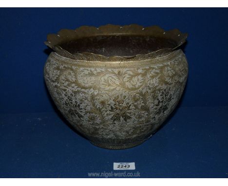 A large brass Planter with ornate floral decoration with figures, 8 1/2'' tall x 10 1/2'' diameter.