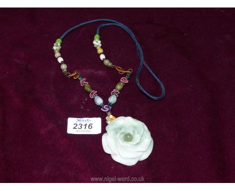 A Lotus Jade Necklace.