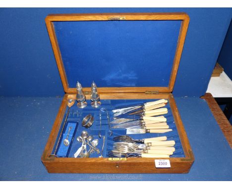 A cutlery box and contents including plated fish eaters, Sterling silver salt and pepper and napkin ring, teaspoons etc, box 