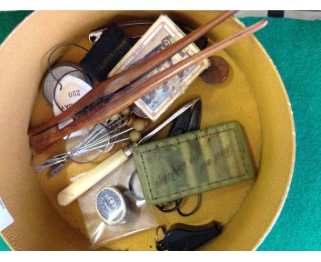 Leather collar box containing misc items to include an unused bakelite 'First Aid for stockings' kit c1950s, 2 pairs of vinta