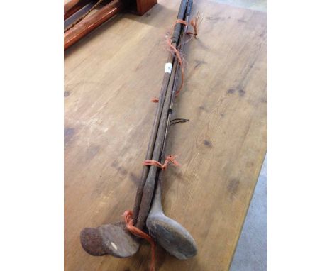 4 vintage golf clubs.  