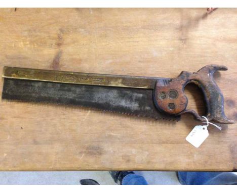 A vintage 14 inch bladed heavy brass back tenon saw by R. Groves & Sons, London. 3 brass medallions secure the oak closed gri