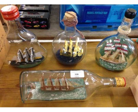 4 vintage ships in bottles.  