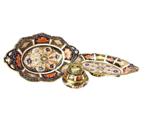 ROYAL CROWN DERBY IMARI COMPORTS, of shaped elliptical form, with pierced handles, on four bracket feet, printed marks to bas