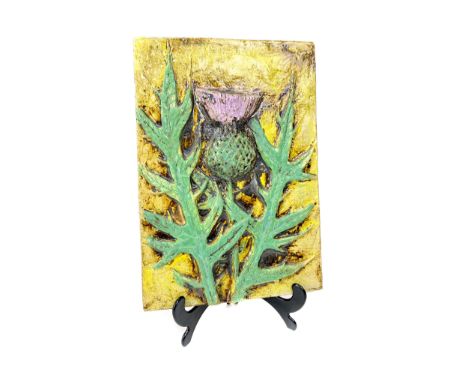SCOTTISH STUDIO POTTERY CERAMIC TILE, decorated with a thistle in relief, on a textured ground, monogrammed 'LK' and dated '1