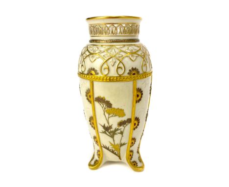 ROYAL WORCESTER VASE, in gilt on a cream ground, with pierced border around the cylindrical neck over panels of flowers and i