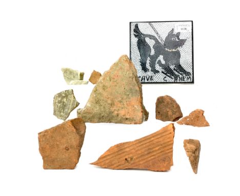 THREE ROMAN TILE FRAGMENT, the largest 11cm wide, along with an Early Christian Roman tile fragment, a 'game' piece, a tile f