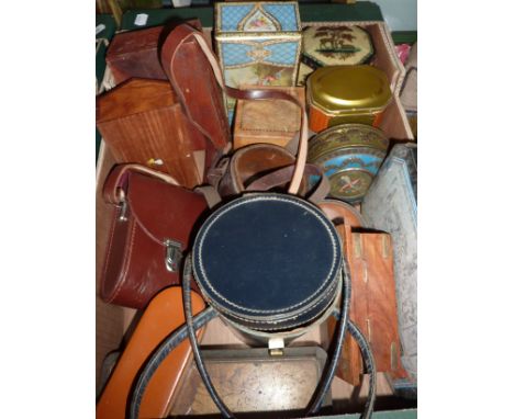 Selection of tins, leather camera cases, decorative boxes etc