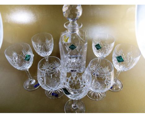 Five Edinburgh crystal drinking glasses, a crystal decanter and two Italian brandy glasses 