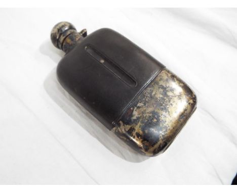 A gentleman's large silver hip flask with part leather body, assay Sheffield 1922 Est £50 - £80