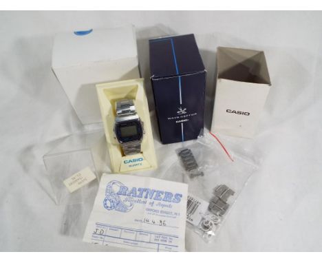 Casio - a gentleman's vintage digital Casio watch, model No. 248254 with display case and a further Casio Wave Ceptor box