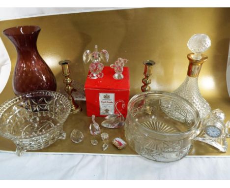 A large quantity of cut crystal to include a crystal decanter, fruit bowls, a Waterford mantel clock a Bohemia letter holder,