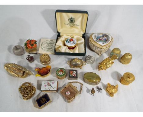 Approximately twenty pill and trinket boxes to include an enamelled Toye, Kenning & Spencer Ltd of London with certificate of