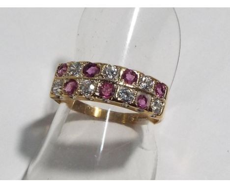 A lady's hallmarked 9ct gold ruby and cz ring, approx weight 1.9 grams, size L