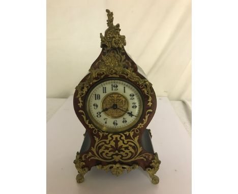 A 19th century faux Boullework clock with non-striking, non-pendulum movement