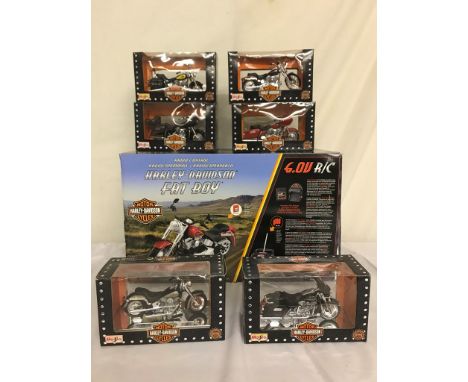 Seven boxed Harley Davidson motorbike models to inc a remote control 'Fat Boy'