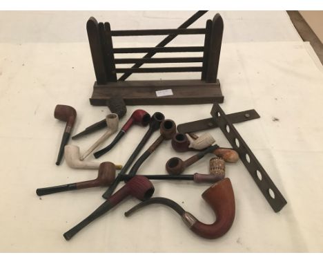 Vintage pipes; together with a five-bar gate pipe rack