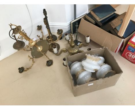 Two single candlesticks, a pair of lamp bases, one with shades and single base