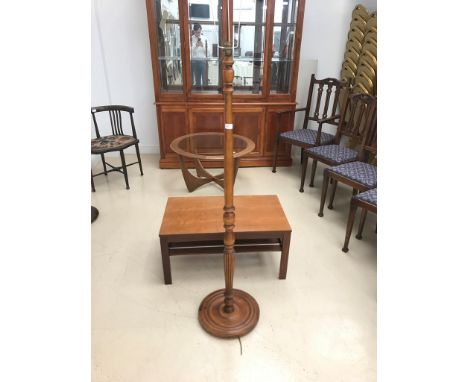 A teak coffee table; together with a standard lamp