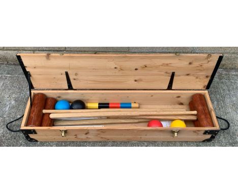 A vintage croquet set in a pine wooden box 